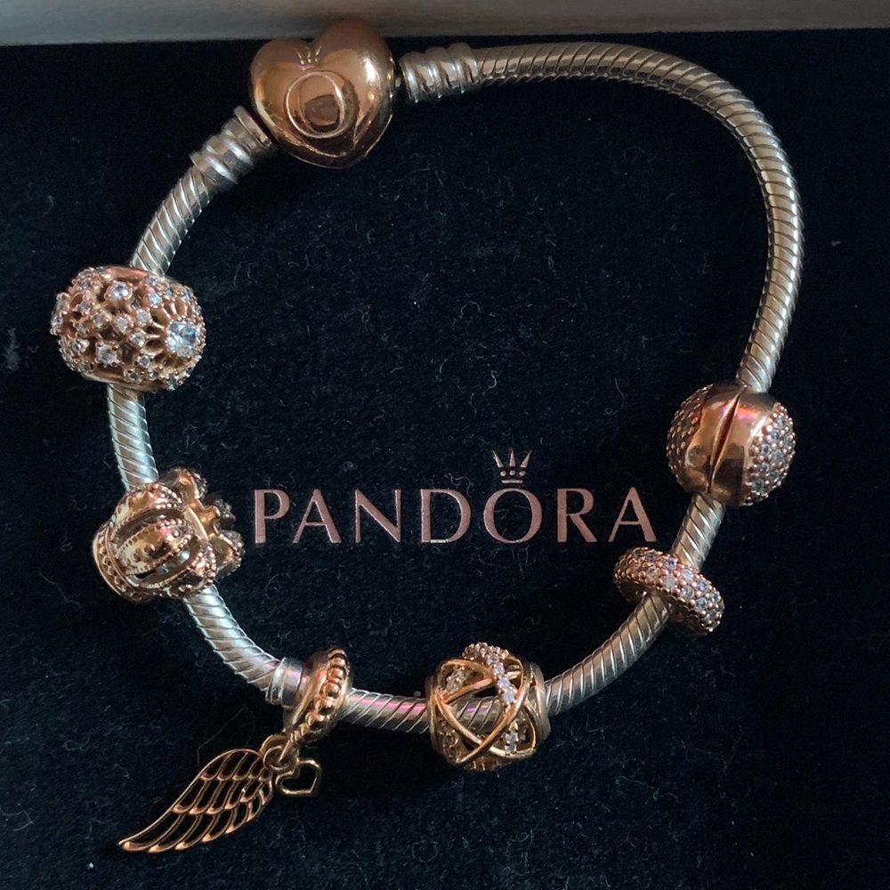 Silver Pandora bracelet with rose gold clasp and rose gold charms $530 retail